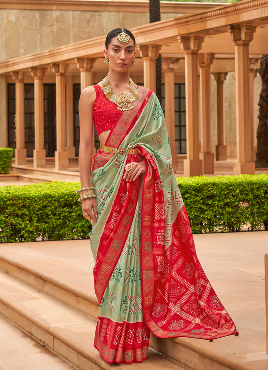 Magnetic Pista Green And Red Colored Printed Pure Soft Silk Saree