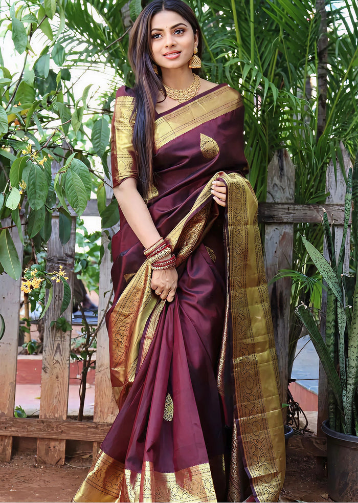 Premium Wine Jacquard Saree – Rich Woven Detailing & Sophisticated Festive Look