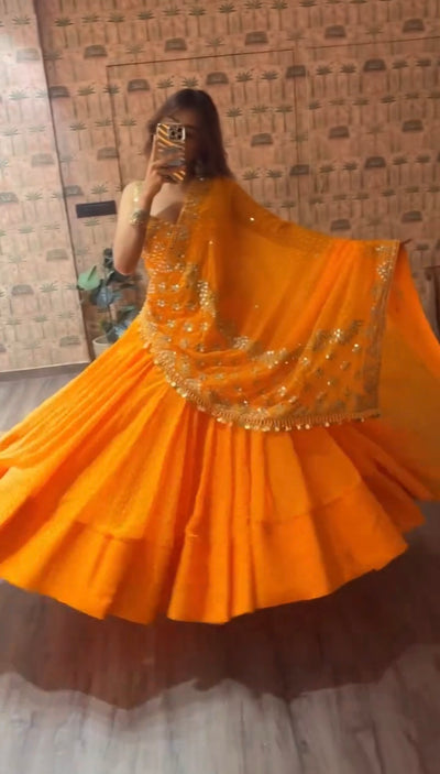 Orange Printed Faux Georgette Lehenga Set