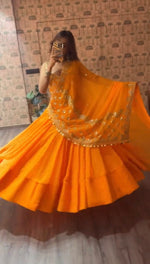 Orange Printed Faux Georgette Lehenga Set
