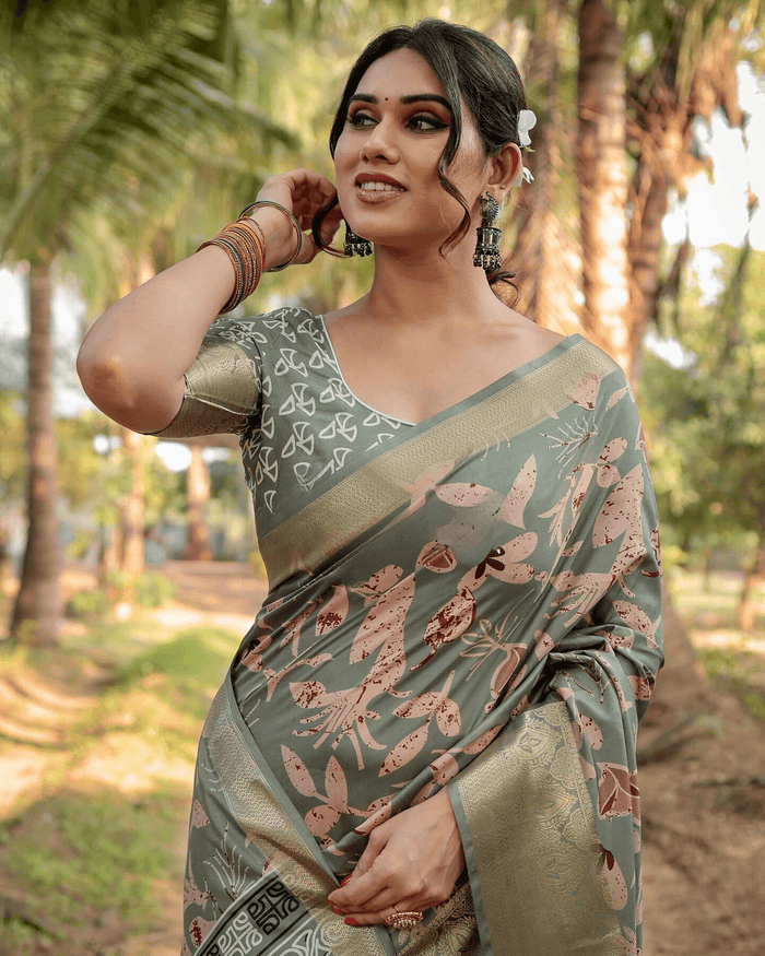Charming Sea Green Colored Jacquard Silk Saree With Zari Border Blouse Piece