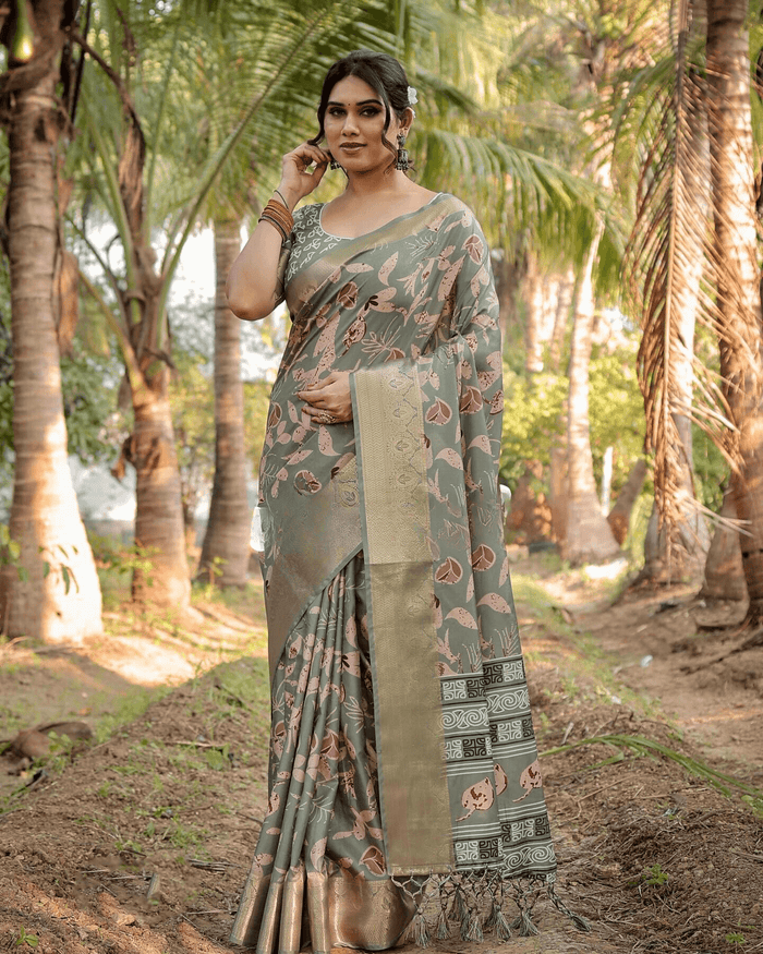 Charming Sea Green Colored Jacquard Silk Saree With Zari Border Blouse Piece
