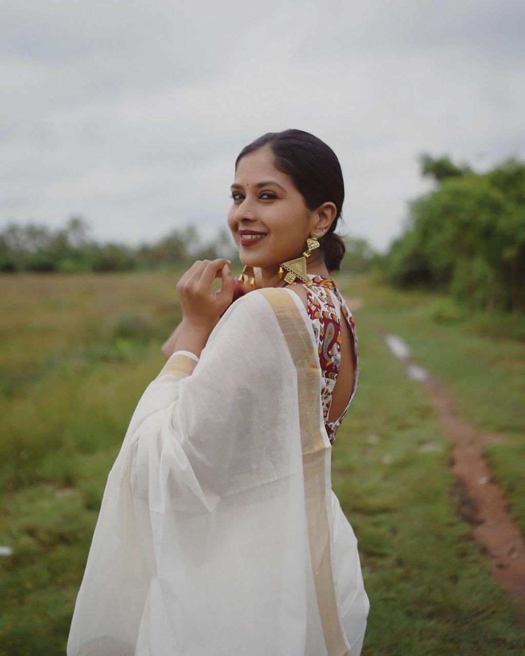 estival Saree in White Soft Linen Silk With Wooven Pallu and Blouse - Ibis Fab
