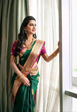 Extravagant green soft silk saree with a classy blouse piece - Ibis Fab