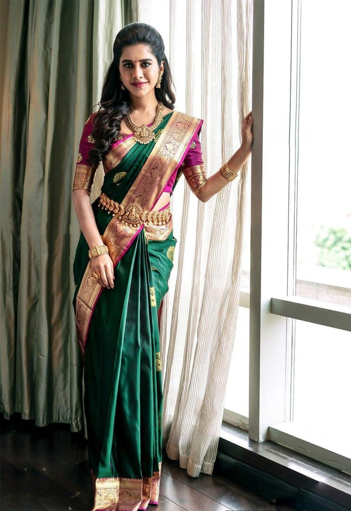 Extravagant green soft silk saree with a classy blouse piece