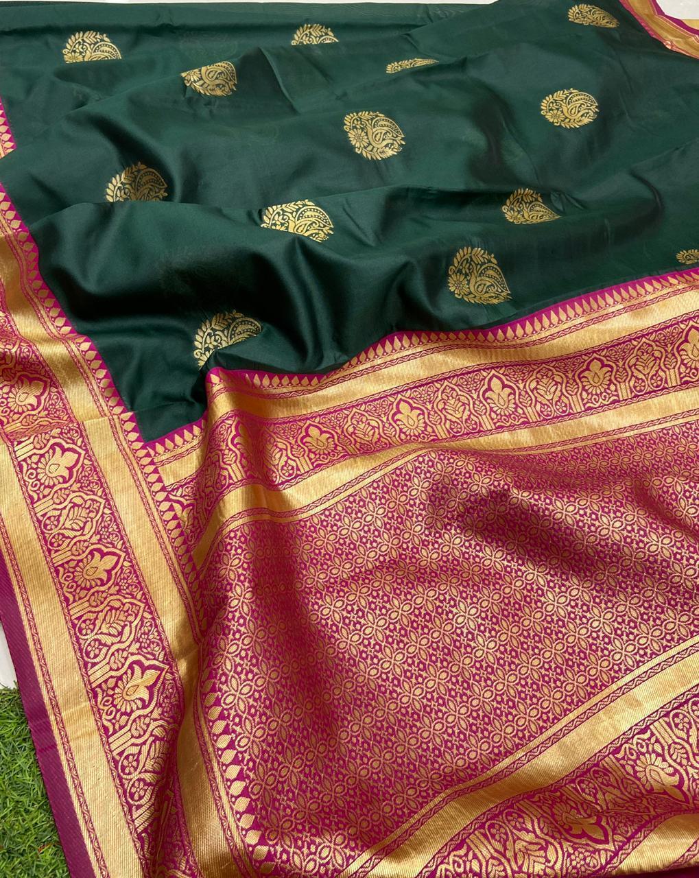 Extravagant green soft silk saree with a classy blouse piece - Ibis Fab