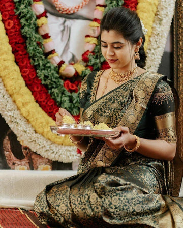 Gorgeous in dark green kanchi pattu saree