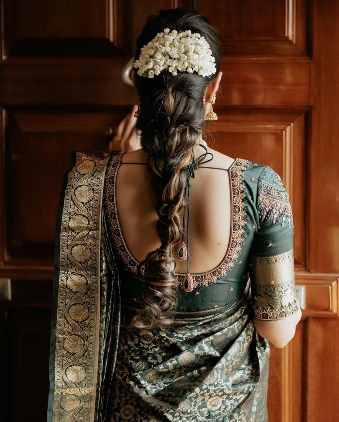 Gorgeous in dark green kanchi pattu saree