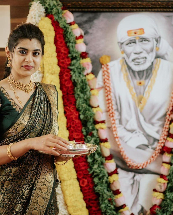 Gorgeous in dark green kanchi pattu saree