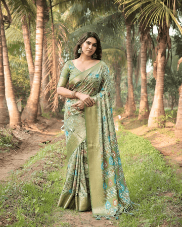 Gorgeous Pista Green Colored Jacquard Silk Saree With Zari Border Blouse Piece