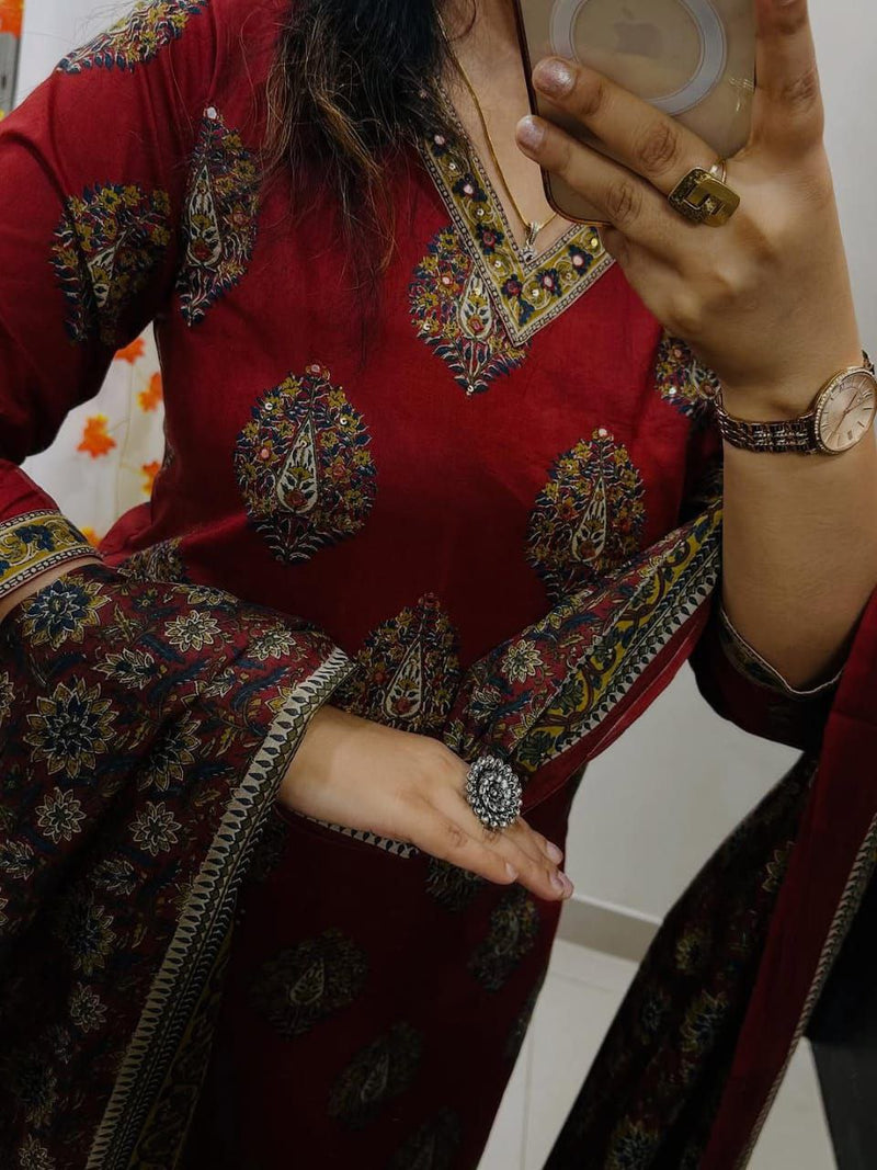 Red Mul Cotton Suit Adorned with Elegant Embroidery