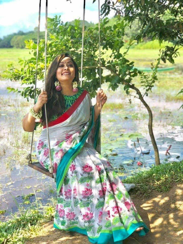 White and Green colored Linen Designer Printed Saree