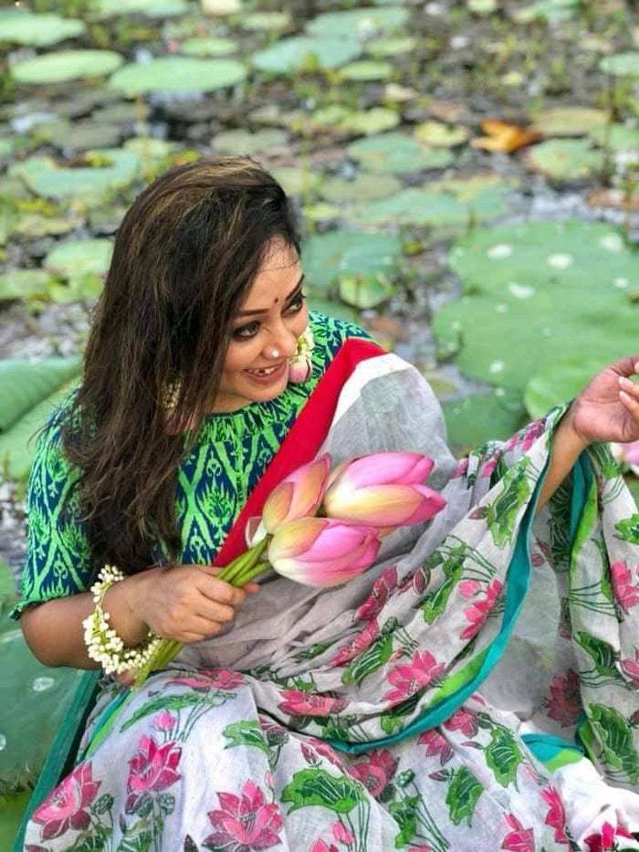 White and Green colored Linen Designer Printed Saree