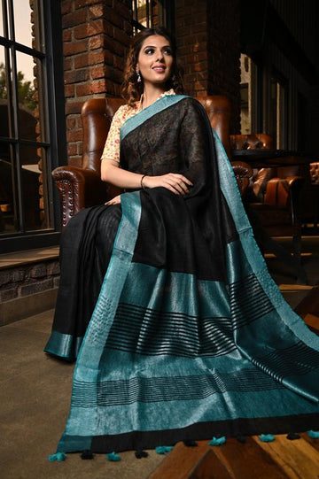 Refreshing Women's Black And Sky Blue Colour Pure Linen Saree With Blouse Piece