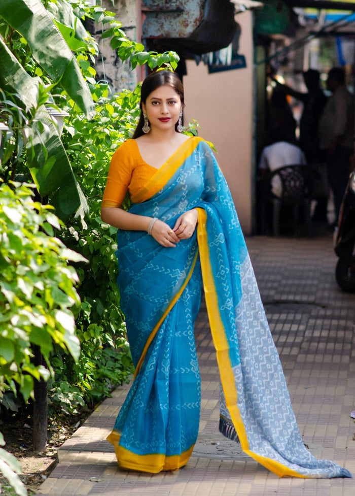 Beautifully Crafted printed Blue Saree By Linen cloth.