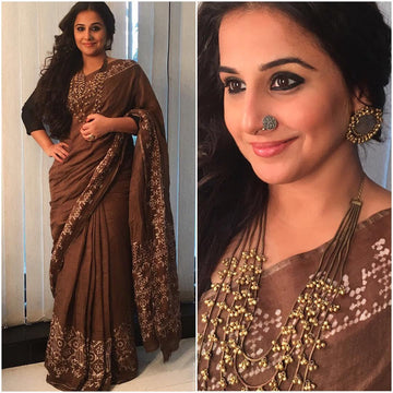Dazzling Dark Brown colored Partywear Linen Designer Printed Saree