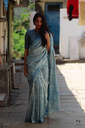 Delightful light blue  colored Flora Linen Designer Printed Saree