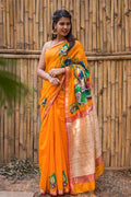 Elegant Orange colored  Designer Linen Printed Saree