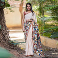 Exceedingly Off White colored Linen Designer printed Saree