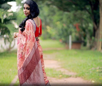 Exceptional  Coral Colored  Festive Printed  Pure Linen Saree