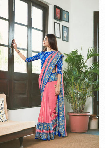 Eye-catchin Baby Pink And Royal Blue Colored PartyWear Pure Linen Saree