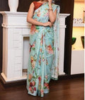 Imposing Mint And Copper Colored Designer Printed Pure Linen Designer Saree