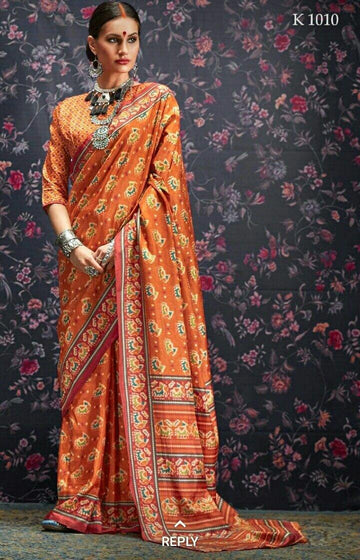 Stunning orange colored Designer Printed Pure Linen Designer Saree