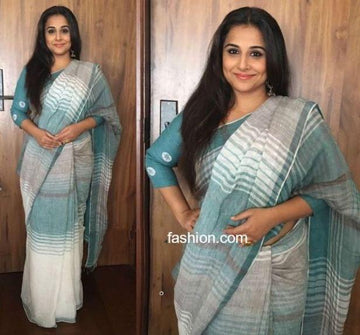 White and light blue colored Partywear Linen Designer Printed Saree